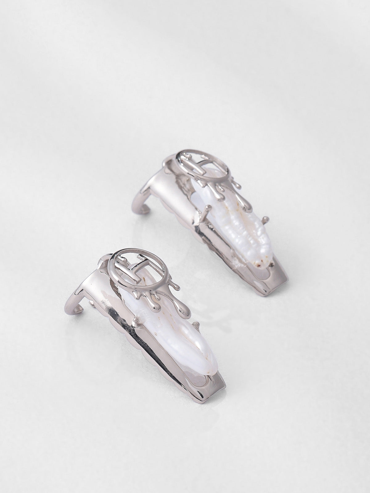 Mauni Roy in Drip Nail Rings