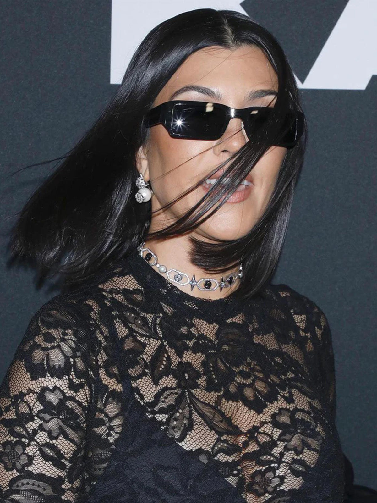 Kourtney Kardashians in Mini Scorpia Studs
