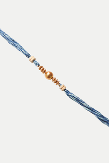 Gold Plated Beaded Rakhi With Blue Thread
