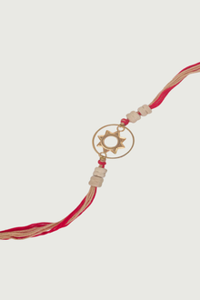  Gold Plated Surya Rakhi With Tulsi Beads