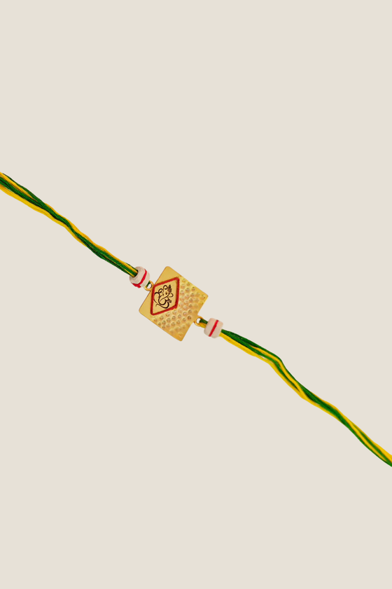 Laser Ganesh Rakhi With Mixed Thread, Tulsi Beads & Gold Plating