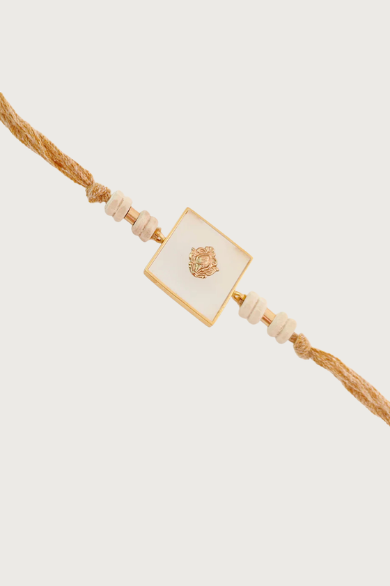 Gold Plated Square Acrylic Rakhi With Tulsi Beads To Pendant