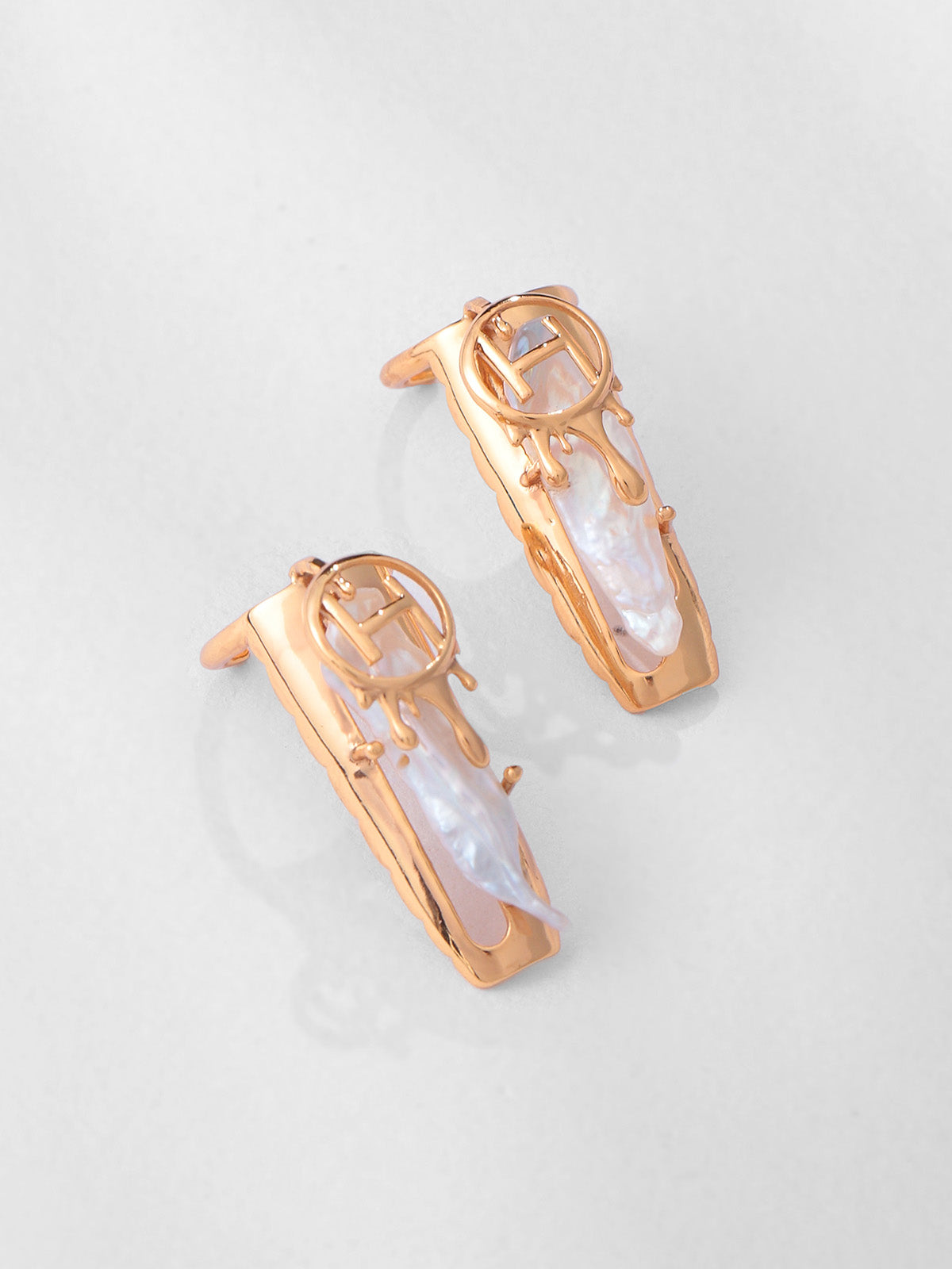 Mauni Roy in Drip Nail Rings